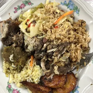 Jerk chicken, curry goat, rice &amp; peas, cabbage