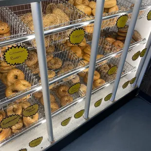 a display of bagels and donuts