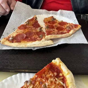 Pepperoni and sausage slices