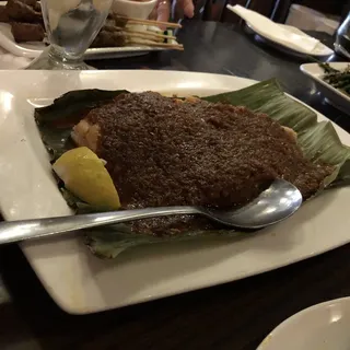 11. Stingray Wrapped with Banana Leaf