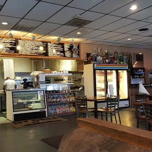 You take a seat wherever and walk up to the front count to place your order.