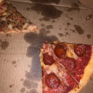 two slices of pepperoni pizza