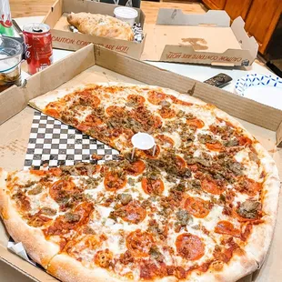 This is the biggest pizza pie and amazing cheese and pineapple calzone