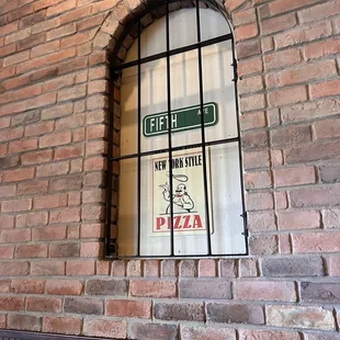 a window in a brick wall