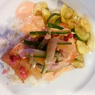 Friday fish special. Seared salmon with coconut ginger rice, sauteed squash, and pomegranate.