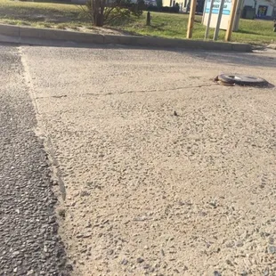 This is the unlevel surface of the gas station that caused my radiator to be damaged!!! Don't go here