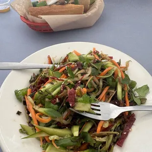 Pork banh mi and cucumber jerky salad (it&apos;s usually papaya)