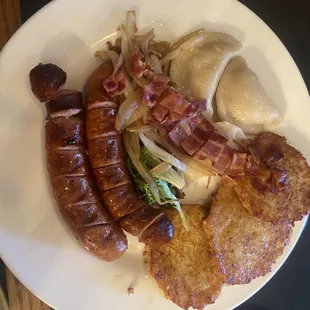 Kozak Platter. Order the perogies pan fried instead of steamed... worth every calorie.