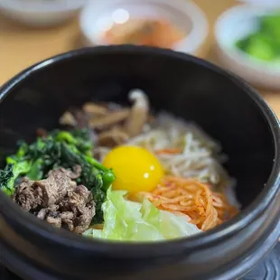 Bibimbap in hot stone. Leave it to cook and the rice gets all nice and crispy!