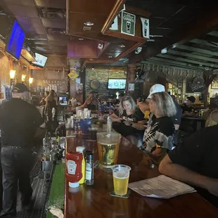 people sitting at the bar