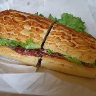 Salami and cheddar on a Dutch crunch roll