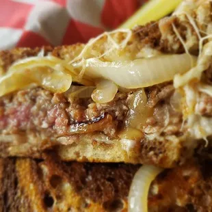 Swiss patty melt cooked perfectly rare