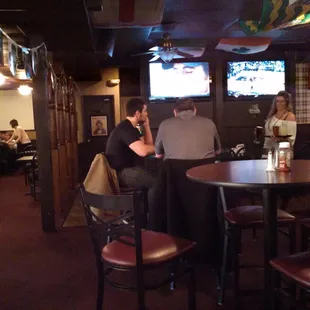 Couple of TVs and the extra dining area.