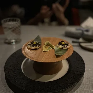 Little snack before the tasting menu: Tart with onion and truffle