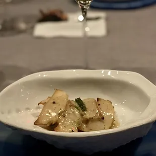 Course 3 of 9 - Abalone SAUTÉED WITH SEAWEED BUTTER, CURRY AND DAIKON. CRISPY RICE