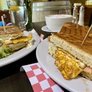 Sandwich with smoked salmon, egg, and avocado on house made focaccia bread