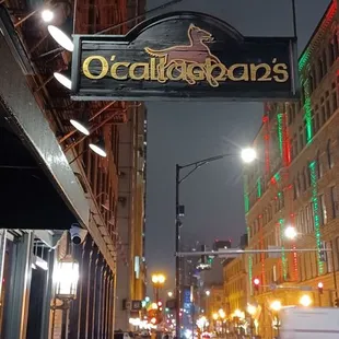 people walking down the sidewalk