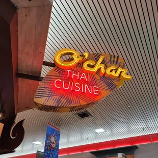 a neon sign for a restaurant