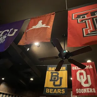University flags - UT only one upside down. So dumb.