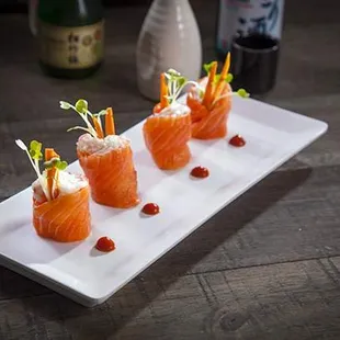 [Salmon Island] Crab Meat, gobo, Radish Sprout wrapped with salmon.