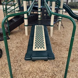 Larger playground has this cool treadmill thing!