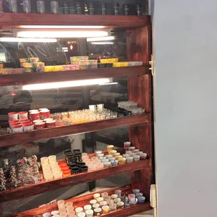 a shelf of liquor bottles