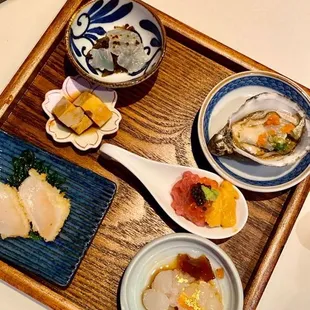 Live lobster sashimi Chopped toro with uni and caviar Oyster Jellyfish