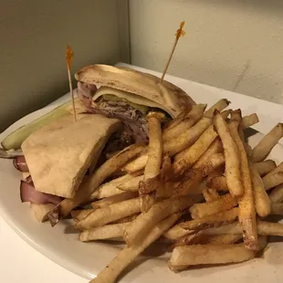 Cuban sandwich special on Naan bread with fresh cut fries