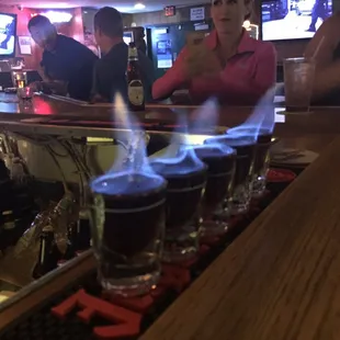 a woman sitting at a bar