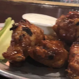 The works wings grilled. Very good! Unique blend of their sauces. Cooked great! $7 not bad these days for 5.