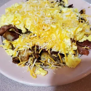 an omelet with bacon and cheese