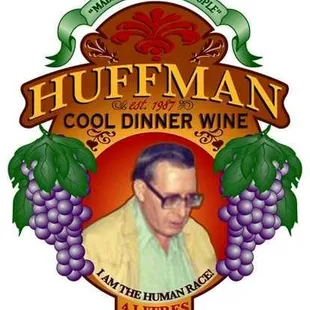 a picture of a man in a suit and glasses