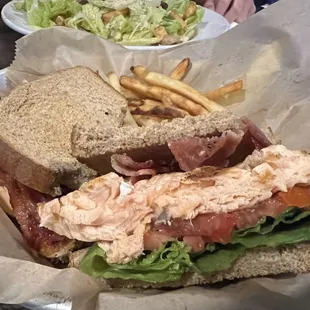 Lunch special Salmon BLT... I&apos;ll pass on this next time.  Salmon tasted old and most of the bacon was half cooked floppy fat.