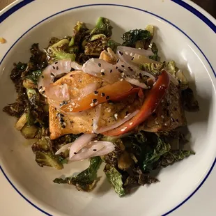 Teriyaki Salmon on a bed of crispy Brussels sprouts.