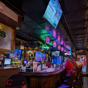 people sitting at the bar