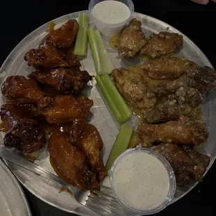 Garlic Parmesan and mango habanero bone in wings