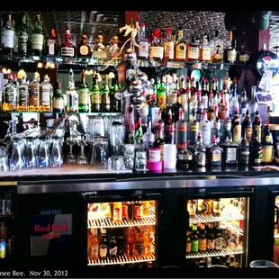 a bar full of alcohol bottles
