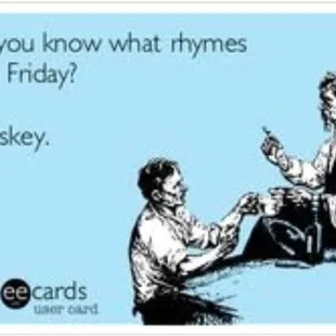 a man giving another man a bottle of whiskey