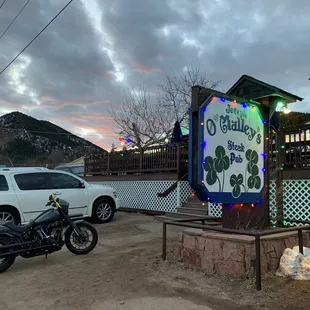 Winter time end of day ride.  View of parking out front.