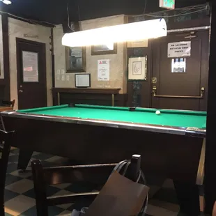 Enjoy a game of pool while waiting for lunch to arrive