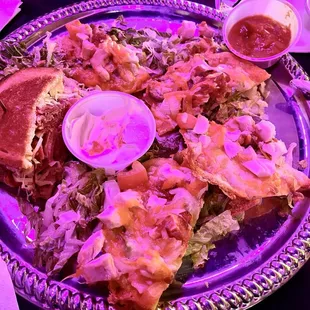1/2 rueben and 1/2 chicken nacho leftovers.