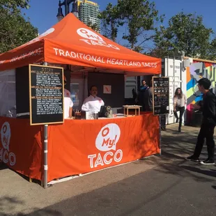 a food stand on a street corner