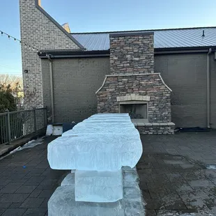 a block of ice in front of a building