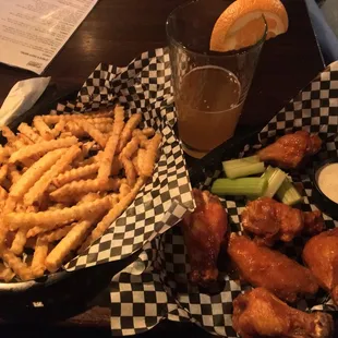 Super good wings and fries.