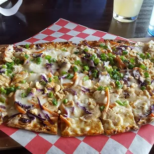 Bangkok Chicken flatbread!  Something different,  but so good! If u like peanuts &amp; chicken. Lol Went great with a Stella