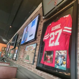 a jersey hanging on the wall