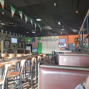 a woman sitting in a booth