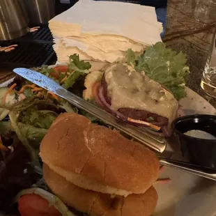 Sad burger with cold cheese.