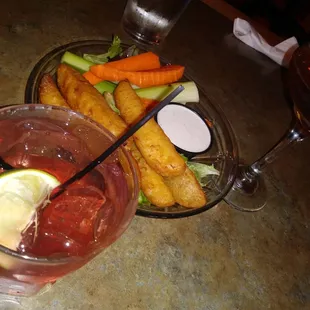 Fried pickles. Manhattan for Pam and cape cod for me.