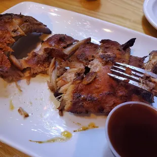 Falling off the bone. (I got my sauce on the side)
